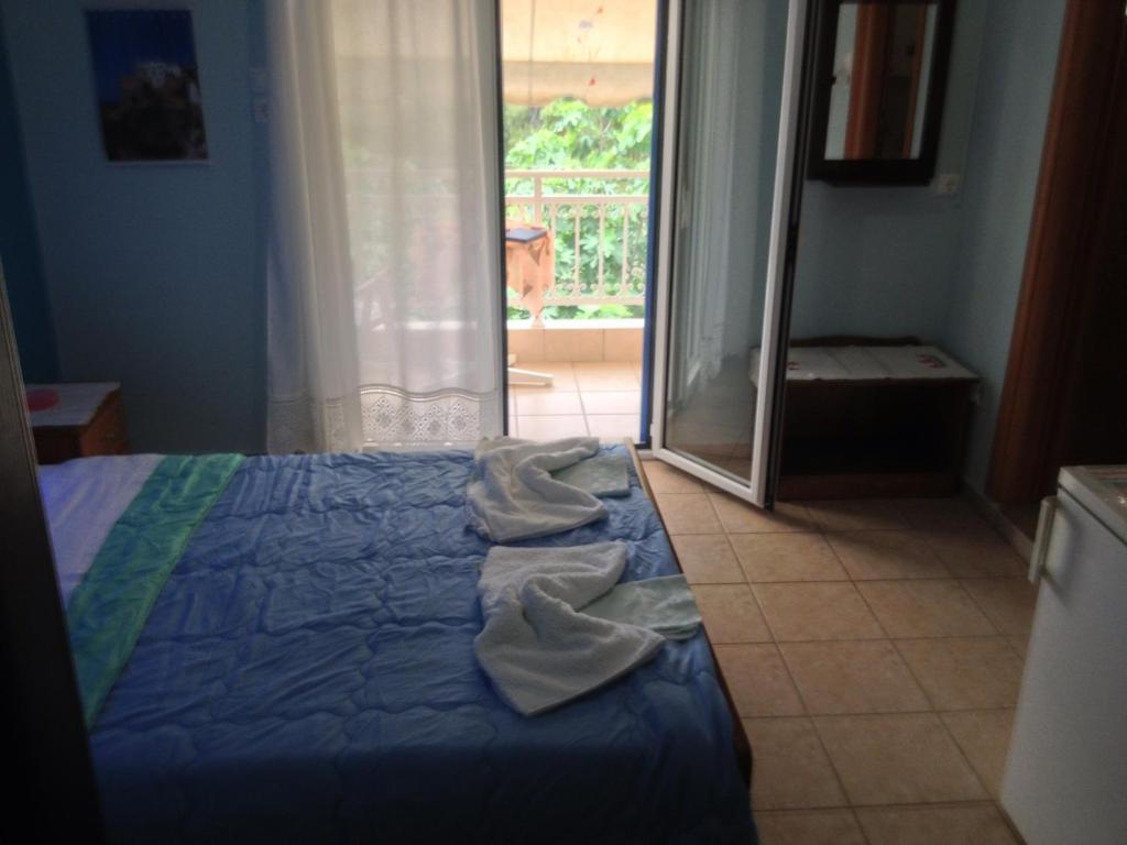 Kostas Rooms Votsi  Rom bilde